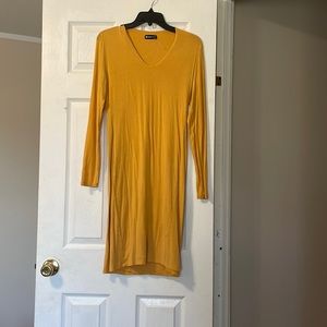 Yellow long sleeve dress.